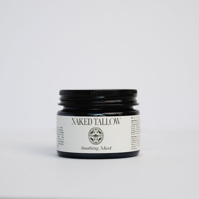 A jar of Naked Tallow Soothing Mask with a black lid and label on a white background.