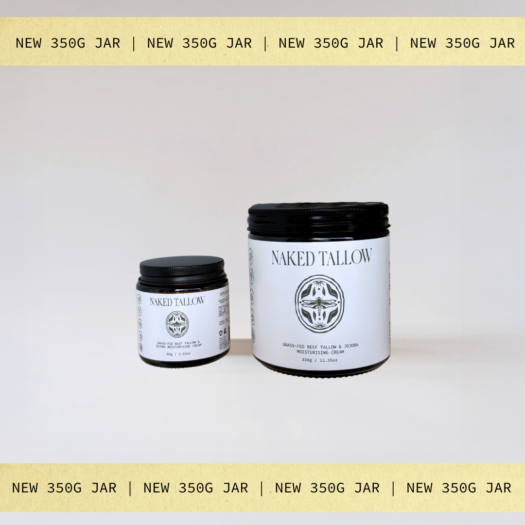 Two 'Naked Tallow' jars with black lids on a white background