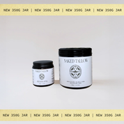 Two 'Naked Tallow' jars with black lids on a white background