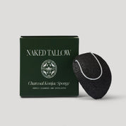 Naked Tallow charcoal konjac sponge with packaging on a light gray background