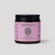 Jar of Naked Tallow cream with pink label on a light gray background