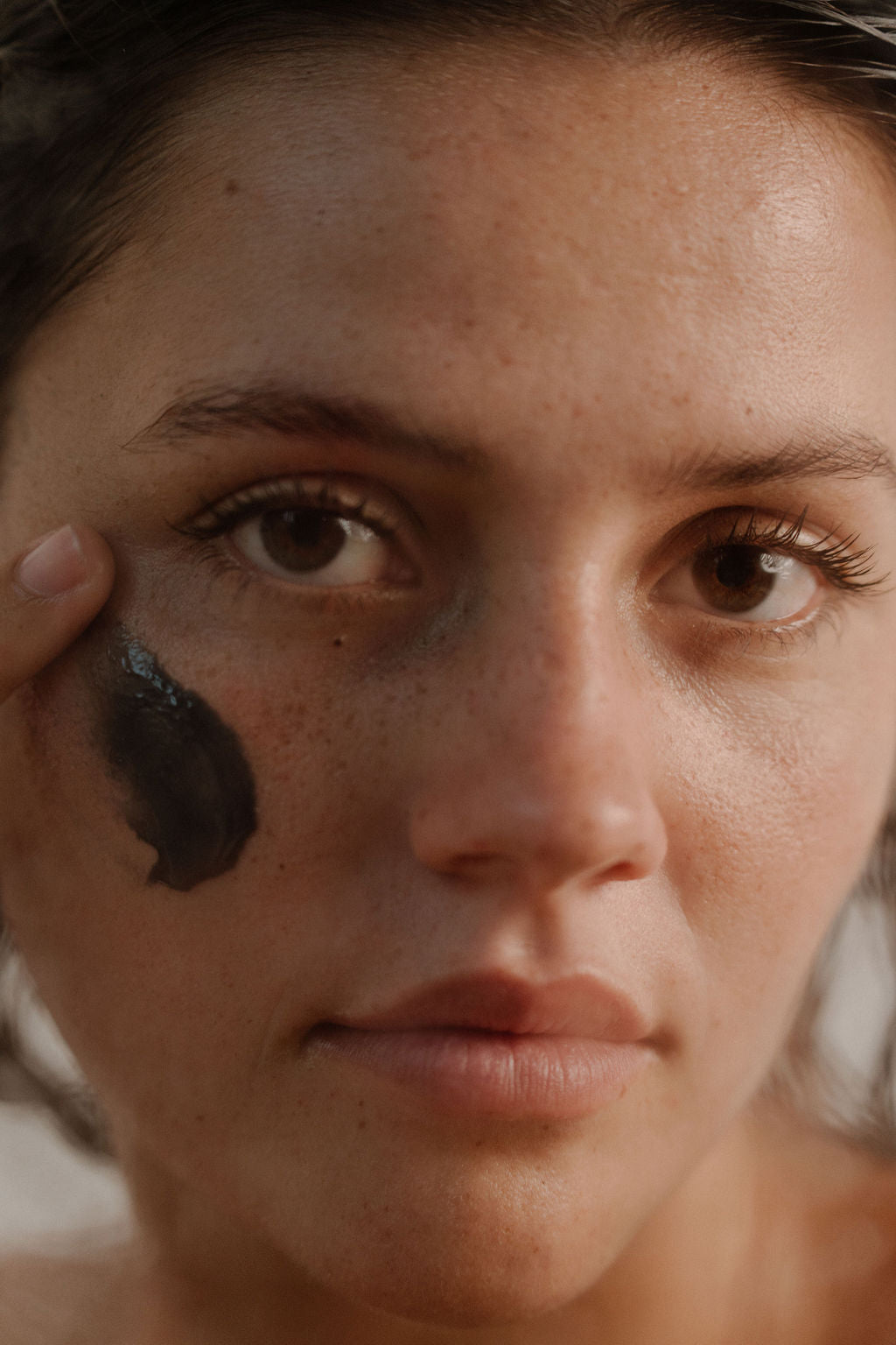 close up of girls face with beef tallow face mask on